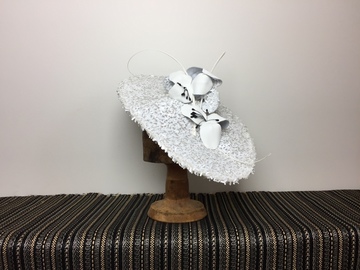 For Rent: White sequin disc with leather flowers