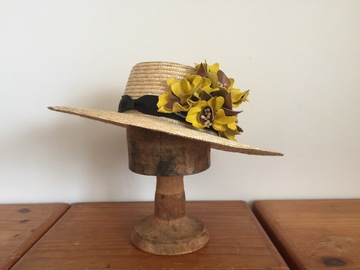 For Rent: straw boater with mustard yellow flowers