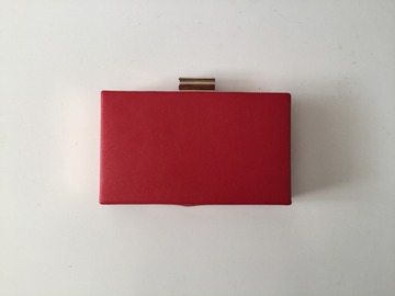 For Rent: Red rectangular clutch