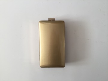 For Rent: Gold rectangular clutch