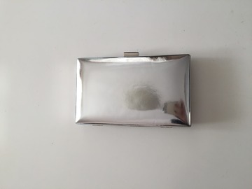 For Rent: Silver clutch