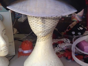 For Rent: White and black millinery with bow detail