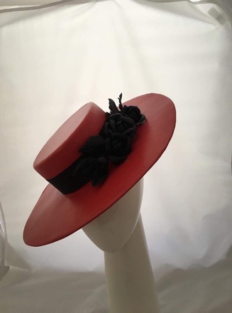 Red leather boater with changeable flowers