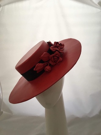 Red leather boater with changeable flowers