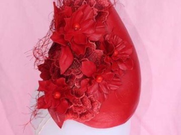 For Rent: Red leather floral percher 