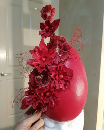 Red leather floral percher 