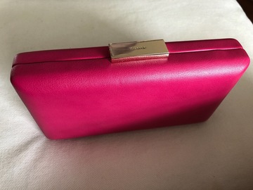 For Rent: Hot pink Olga Berg clutch