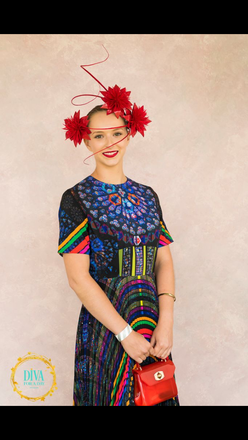 Red floral headpiece with quills