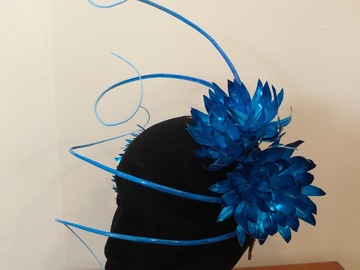 For Rent: Blue metallic metal flowers with ombré quills