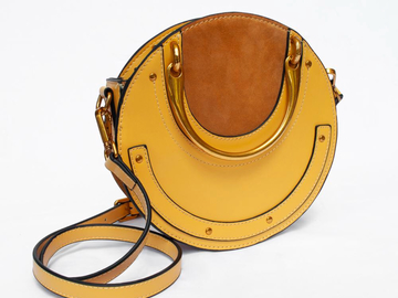 For Rent: Yellow leather circle bag 