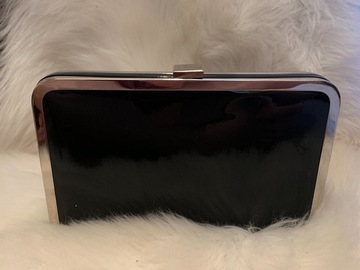 For Rent: Black Clutch 