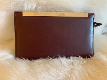 For Rent: Maroon clutch 