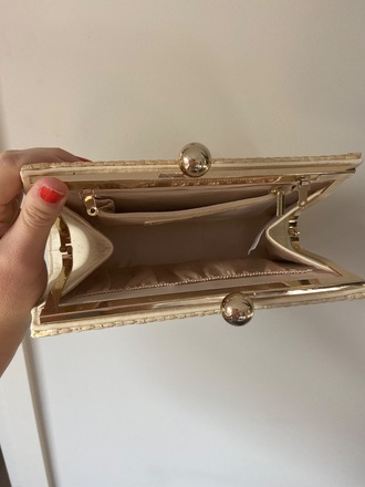 Straw clutch with gold detail 