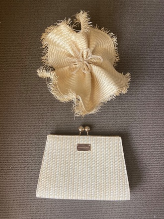Straw clutch with gold detail 