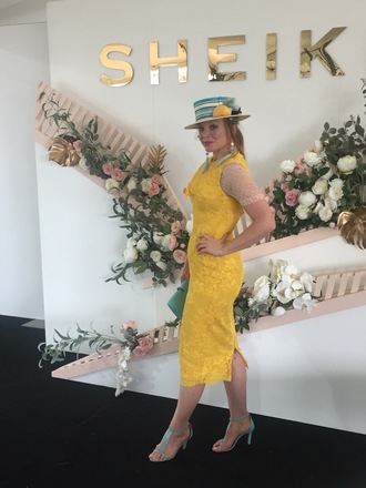 Straw boater with vintage ribbon, pom poms and veiling