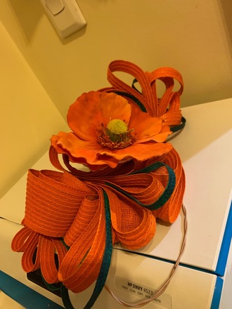 Orange & dark green Claire Hahn headpiece 