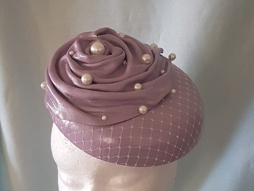 For Sale: Lilac leather and pearl button 