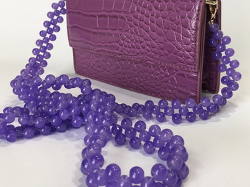 For Rent: Purple textured clutch bag 