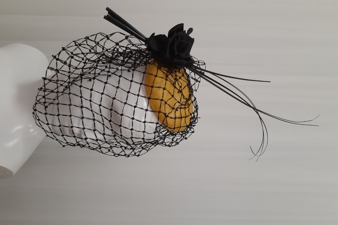 Black and yellow button with vintage veil