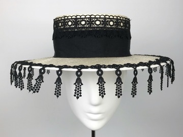 For Rent: Derby day boater with lace fringe.