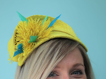 For Sale: Yellow raffia headpiece with blue feather detail
