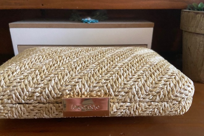 Olga Berg Natural woven pod clutch