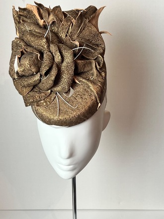 Gold leather pillbox with handmade leather flower