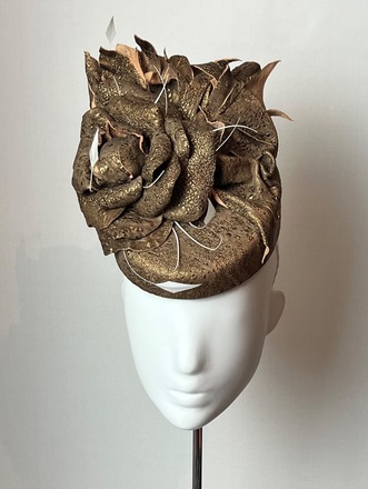 Gold leather pillbox with handmade leather flower