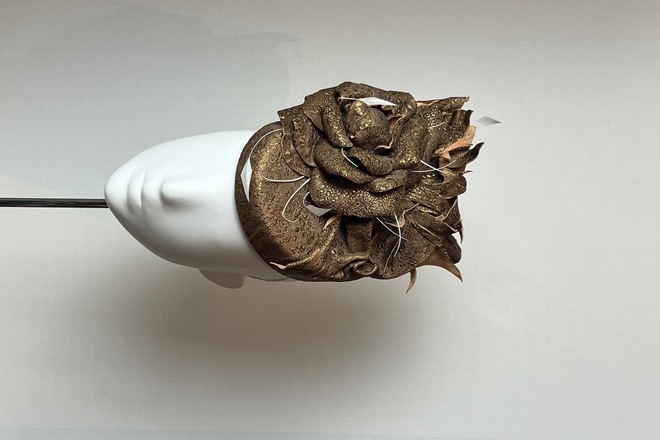 Gold leather pillbox with handmade leather flower