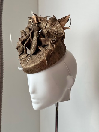 Gold leather pillbox with handmade leather flower