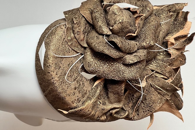 Gold leather pillbox with handmade leather flower