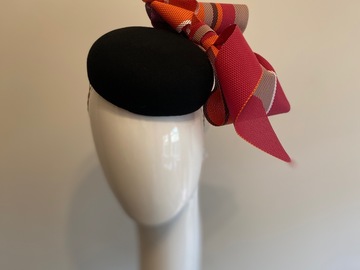 For Sale: Black felt button with multicoloured bow