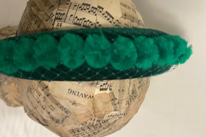 Green Pom Pom headband wrapped in veiling