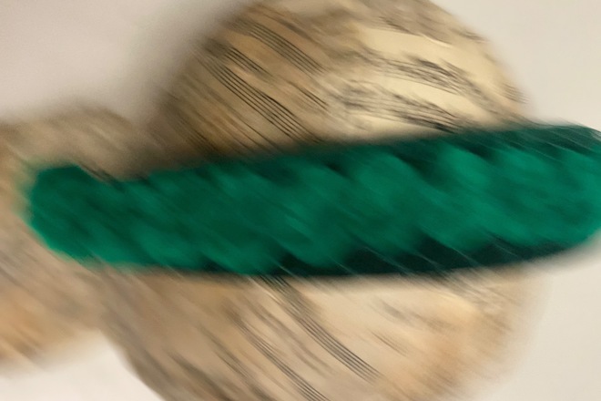 Green Pom Pom headband wrapped in veiling