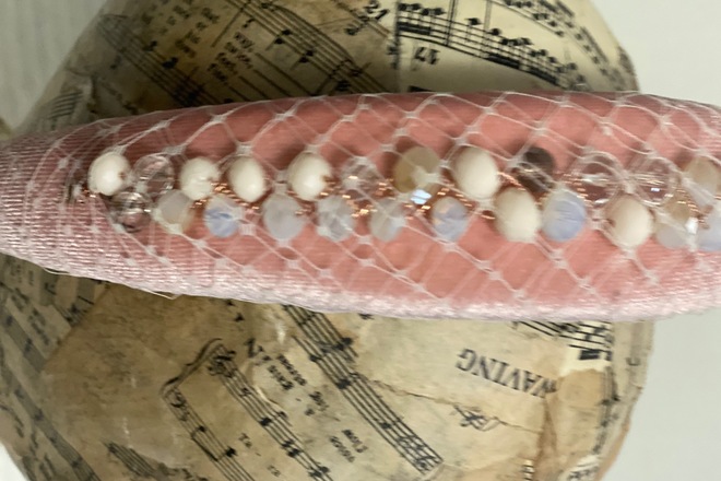 Soft pink headband with jewels wrapped in veiling 
