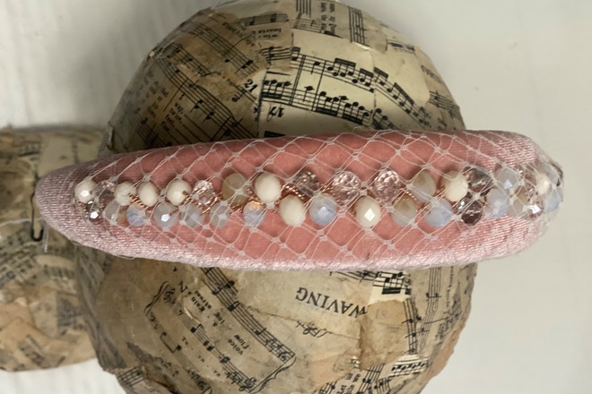 Soft pink headband with jewels wrapped in veiling 