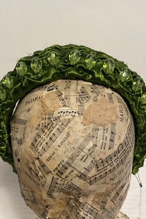 Olive green velvet headband with jewels on top