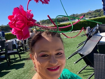 For Rent: Pink feather flowers and quills on a headband