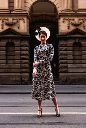 Mia Ivory Breton with black straw knot trim