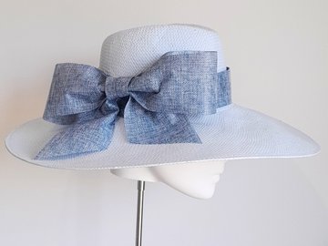 For Sale: Blue straw wide fedora brim hat and linen bow
