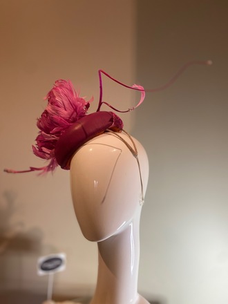 Magenta leather button with feather flowers