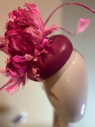 Magenta leather button with feather flowers