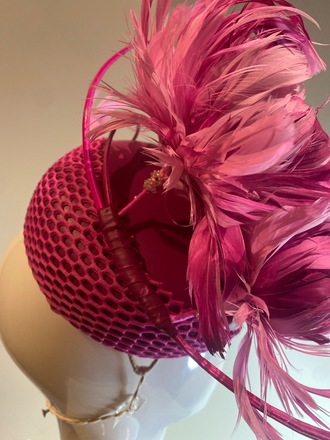 Magenta leather button with feather flowers