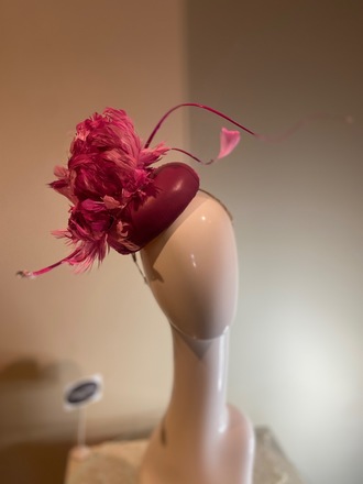 Magenta leather button with feather flowers