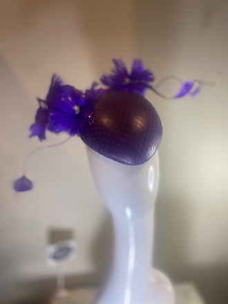 Purple leather hat with feather flower 
