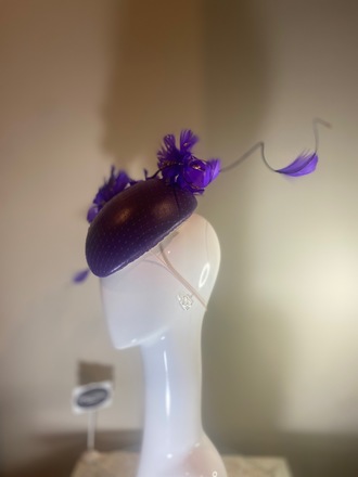 Purple leather hat with feather flower 