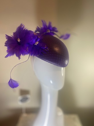 Purple leather hat with feather flower 