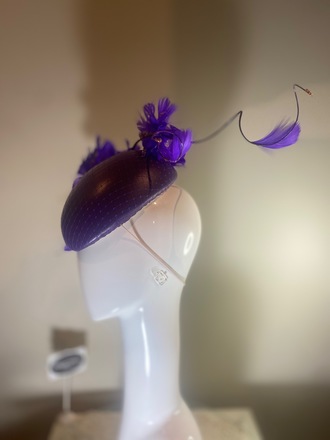 Purple leather hat with feather flower 