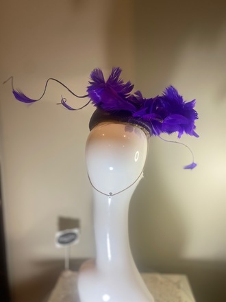 Purple leather hat with feather flower 