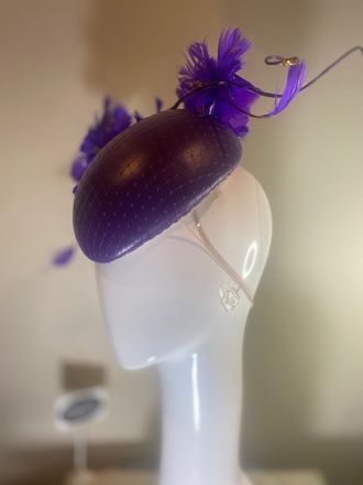 Purple leather hat with feather flower 